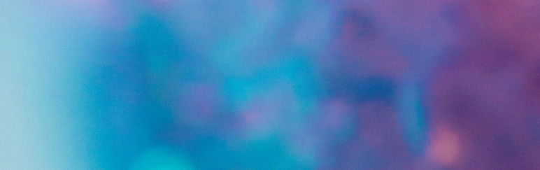 closeup blurry image of crystal with mostly blue